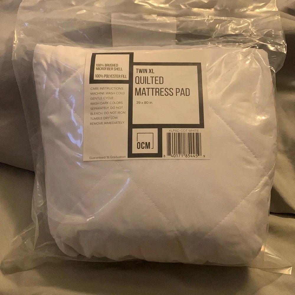 New in plastic! Twin XL Quilted mattress pad.